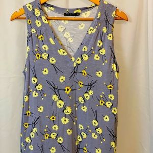 MAX JEANS SLEEVELESS GREY FLORAL TOP THAT IS TSHIRT MATERIAL AND VERY COMFY.